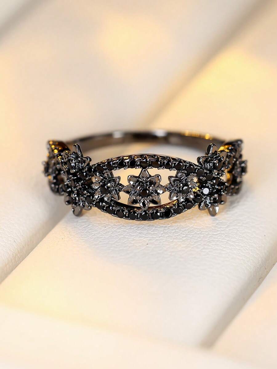 1 chiếc nhẫn hình hoa sao rỗng bằng đá Zirconia đen. - nhẫn - Xem 1