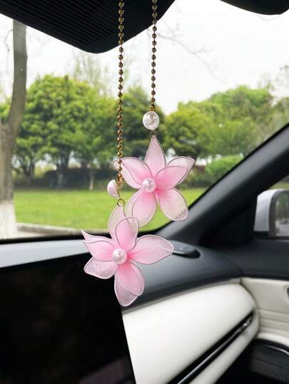 Mặt dây chuyền hoa lưới sáng tạo treo trên gương chiếu hậu ô tô.