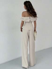 Elegante conjunto de dos piezas para mujer, compuesto por top de hombros descubiertos Bardot y pantalones wide leg de talle alto.Color sólido en tono neutro, diseño favorecedor y confortable.Perfecto para looks diarios, salidas informales y ocasiones semiformales. - Caqui - Ver 2