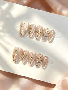 10 móng giả thủ công màu nude trong suốt hình mắt mèo, dáng hạnh nhân, đính đá 3D hình trăng lưỡi liềm và ngôi sao vàng, có thể tái sử dụng. - Nhiều màu - Xem 3