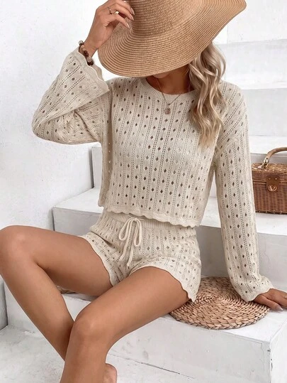 女士优雅基础款纯色针织镂空圆领长袖上衣搭配抽绳短裤套装，适合春夏日常、休闲、周末、度假、旅行、海滩等场合。
