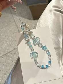 1 pezzo Cordino per telefono con perline a forma di stella marina e pesce, colore blu sale marino, accessorio estivo fresco per cinturino macchina fotografica CCD - celeste - Visualizzare 5