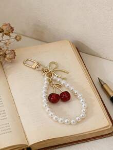 Llavero de cristal transparente multicolor con perla en forma de cereza, cordón delicado con lazo, accesorio versátil y femenino para bolso - Multicolor - Ver 9