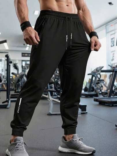 Quần thể thao nam cạp chun có dây rút, thích hợp cho các hoạt động ngoài trời và tập gym, mùa hè.