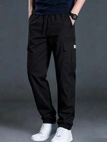 Pantalon cargo ample pour hommes, design robuste à plusieurs poches, style avec lien à la cheville, tenue décontracté à la mode pour le printemps et l'automne - Noir - Voir 2