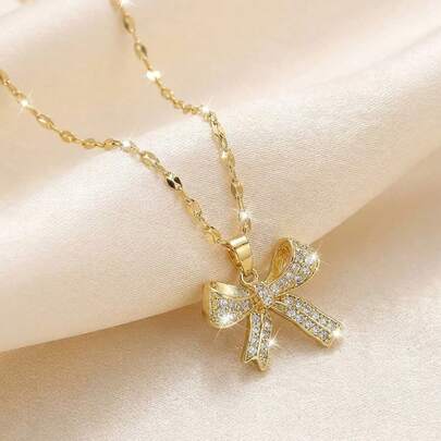 1 chiếc dây chuyền mặt nơ lấp lánh, xinh xắn, thời trang dành cho bé gái, đính đá Cubic Zirconia, quà sinh nhật và trang sức vàng đeo hàng ngày, thích hợp cho mùa tựu trường.