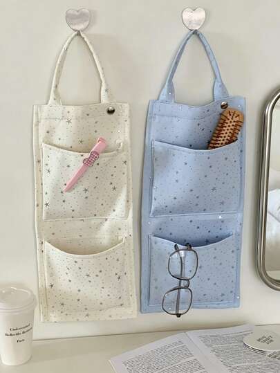 1 pieza Organizador de pared colgante con estampado de estrella estético, bolsa colgante de tela con múltiples bolsillos para dormitorio, dormitorio y baño, organizador de pared bohemio lindo para artículos pequeños, cosméticos, gafas, herramientas para el cabello, sin necesidad de perforar, bolsa de almacenamiento montada en la pared ahorradora de espacio para decoración y organización del hogar, patrón de estrella en tonos pastel blanco/azul para adolescentes, habitación de niñas