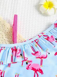 Bộ đồ bơi liền thân in hình chim hồng hạc, viền bèo nhún, thích hợp cho bơi lội, vui chơi trên bãi biển và các hoạt động dưới nước khác dành cho bé gái. - Màu xanh nhạt - Xem 3