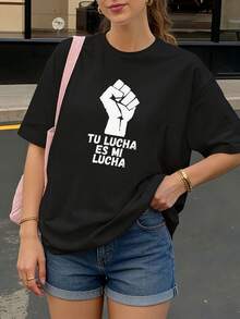 Camiseta Negra con Puño y Texto Tu Lucha Es Mi Lucha para Mujer Casual - Negro - Ver 1