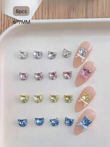 8 viên đá đính móng hình đầu mèo K9 chất lượng cao, bề mặt óng ánh tuyệt đẹp, hình dáng mèo KT tinh tế với điểm nhấn nơ, thiết kế đính đá lấp lánh. Nhiều màu sắc để lựa chọn, phù hợp với nhiều kiểu trang trí móng khác nhau, chắc chắn và dễ sử dụng, tạo nên vẻ ngoài sang trọng cho móng tay, phụ kiện trang trí móng DIY phổ biến. - Nhiều màu - Xem 2