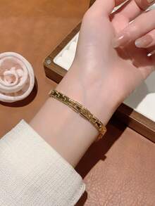 1 件女士金色椭圆形石英表，优雅时尚，适合日常佩戴、生日、毕业礼物、休闲聚会和派对。 - 金色 - 查看 6