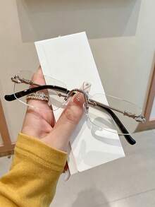 1件金屬無框不對稱長方形小框眼鏡，適合日常通勤，展現精緻優雅。百搭設計，適合休閒穿著與正式場合。鏡框簡約經典，時尚扁平設計，極輕量且佩戴舒適。 - 彩色 - 查看 6