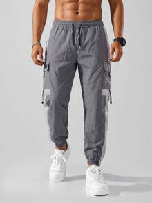 CZRLHYT Pantaloni kaki largi pentru bărbați, cu buzunare cu clapă, pantaloni jogger kaki pentru bărbați, de vară, cu talie cu șnur, cu design lateral unic, potriviți pentru diverse activități în aer liber, talie cu șnur, buzunare laterale, toamnă - Gri - Vizualizare 5