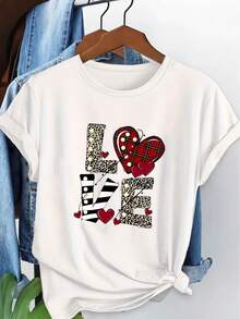 Camiseta de algodón de manga corta para mujer, camiseta de talla grande con estampado de corazones, top casual de manga corta con cuello redondo y diseño de corazón con estampado de leopardo para el Día de San Valentín, adecuada para uso diario y como el mejor regalo. - Negro - Ver 2
