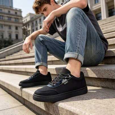 รองเท้าผ้าใบผู้ชายสีดำคลาสสิก | รองเท้าลำลองหุ้มข้อต่ำน้ำหนักเบาระบายอากาศได้ดี | รองเท้าแฟลตผูกเชือกใส่สบาย | เหมาะสำหรับใส่ในชีวิตประจำวันฤดูใบไม้ผลิ/ฤดูร้อน, สไตล์สตรีท, ท่องเที่ยวและวันหยุด, ของขวัญ