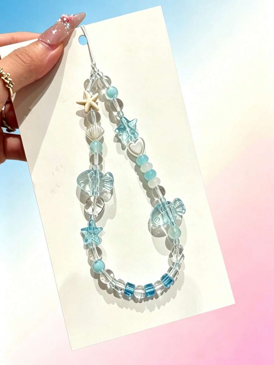 1 pezzo Cordino per telefono con perline a forma di stella marina e pesce, colore blu sale marino, accessorio estivo fresco per cinturino macchina fotografica CCD - celeste - Visualizzare 1