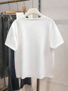 Camiseta de manga corta con cuello redondo y estampado floral de hibisco y eslogan, estilo casual minimalista y fresco para chicas adolescentes, ideal para el verano. - Blanco - Ver 5