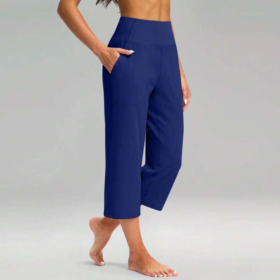 Pantalones elásticos de cintura alta 3/4 para mujer, pantalones capri informales de ajuste activo, pantalones con bolsillos, pantalones deportivos informales de color sólido - Azul - Ver 1