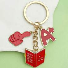 A+ 成绩励志书籍钥匙扣，考试奖励鼓励钥匙扣，可爱表扬主题钥匙扣，珐琅合金校园风钥匙扣，可爱红色学习元素钥匙扣，时尚学生日常配饰 - 彩色 - 查看 5