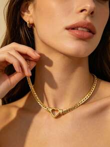 Bộ trang sức tối giản bằng thép không gỉ gồm dây chuyền và vòng tay, thiết kế hình trái tim rỗng, thích hợp cho nữ giới đeo đi dự tiệc, họp mặt, du lịch hoặc những buổi đi chơi thời trang. - Vàng - Xem 6