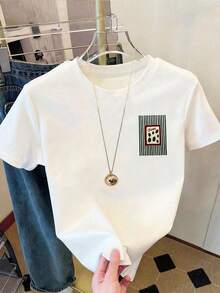 女士白色短袖圆领T恤，饰有独特的橄榄图案印花，采用高弹面料，常规版型，适合休闲夏季街头风格。 - 白色 - 查看 2