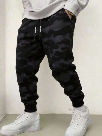 Quần dài nam nhẹ, họa tiết rằn ri, có dây rút, kiểu dáng thời trang cho hoạt động ngoài trời mùa hè.