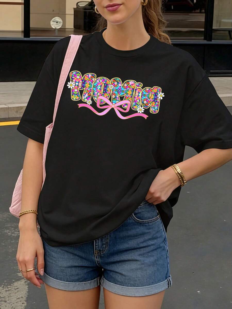 Camiseta negra con estampado floral y texto Momia para mujer estilo casual - Negro - Ver 1