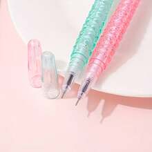 Bộ 6 bút bi gel lấp lấp lánh hình đuôi nàng tiên cá, kèm mặt dây chuyền hình sao biển, thân bút hình bầu dục bằng nhựa, nắp bấm, ngòi cỡ trung bình, mực đen 0.5mm, thích hợp cho người lớn. - Bút nàng tiên cá - Xem 7