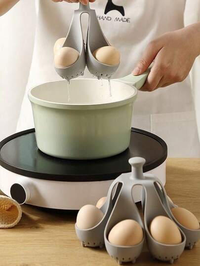 Nuevo cocedor de huevos de silicona, hervidor de huevos resistente al calor, rejilla y molde para cocinar huevos, soporte para huevos para el hogar