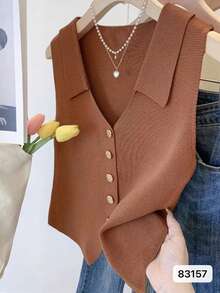 1 chiếc áo vest dệt kim không tay phối màu đen, trắng và nâu nhạt, kiểu dáng Pháp, ôm sát, cổ giả, thích hợp cho lễ hội và du lịch. - Nhiều màu - Xem 9