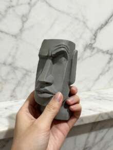 Tác phẩm tái hiện táo bạo tượng Moai! Thiết kế độc đáo với phần lông mày nhô cao, kết hợp nét quyến rũ cổ xưa với phong cách hiện đại. Lý tưởng cho lối vào, văn phòng hoặc làm quà tặng, mang đến sự thú vị cho không gian. - 1PC - Xem 6