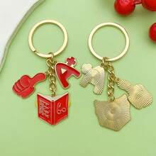 A+ 成绩励志书籍钥匙扣，考试奖励鼓励钥匙扣，可爱表扬主题钥匙扣，珐琅合金校园风钥匙扣，可爱红色学习元素钥匙扣，时尚学生日常配饰 - 彩色 - 查看 4