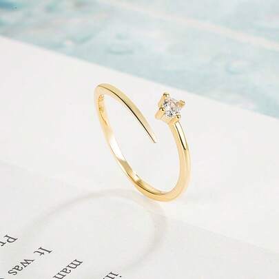 1 chiếc nhẫn hở điều chỉnh được, thiết kế tối giản, độc đáo dành cho nữ.