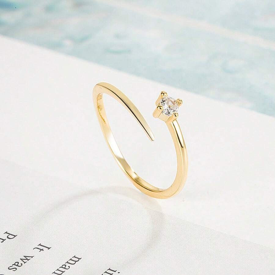 1 chiếc nhẫn hở điều chỉnh được, thiết kế tối giản, độc đáo dành cho nữ.