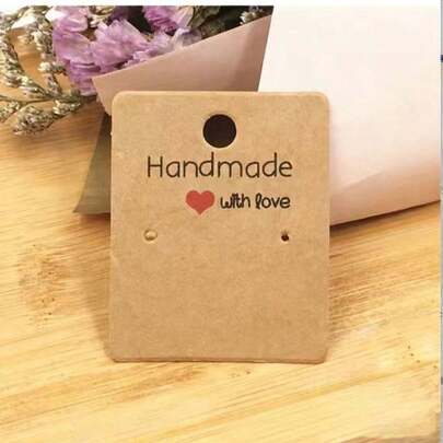 1 Bộ (100 chiếc) Thẻ trưng bày khuyên tai hình trái tim tối giản, giấy Kraft cổ điển 1.97inx1.57in, thẻ trưng bày khuyên tai cao cấp màu trắng, thích hợp để trưng bày đồ thủ công, trang sức, mỹ phẩm và phụ kiện.