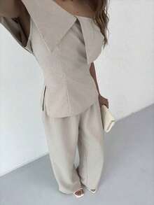 Elegante conjunto de dos piezas para mujer, compuesto por top de hombros descubiertos Bardot y pantalones wide leg de talle alto.Color sólido en tono neutro, diseño favorecedor y confortable.Perfecto para looks diarios, salidas informales y ocasiones semiformales. - Caqui - Ver 7