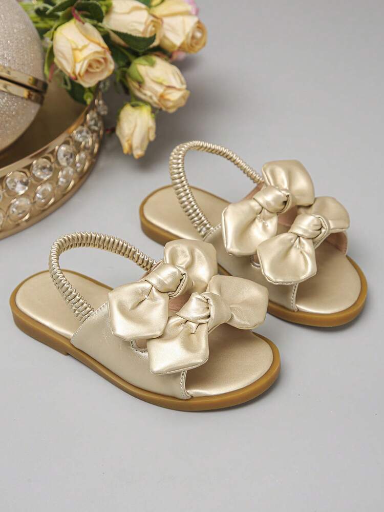 1 Đôi sandal mùa hè hở mũi bằng satin màu sâm panh dễ thương có nơ cho bé gái, thiết kế gót co giãn, đế mềm và thoáng khí, thích hợp cho bé gái đi hàng ngày, dự tiệc, lễ Phục sinh và du lịch nghỉ lễ. - Vàng - Xem 3