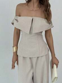 Elegante conjunto de dos piezas para mujer, compuesto por top de hombros descubiertos Bardot y pantalones wide leg de talle alto.Color sólido en tono neutro, diseño favorecedor y confortable.Perfecto para looks diarios, salidas informales y ocasiones semiformales. - Caqui - Ver 5