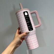 HYDROO-JUGG, 40 Oz, Powder White/Black/Caffeine, Insulated Cup Ice Booster Cup, Mug Water Cup, Great Gift Item. Three Patterns Of Checkered Designs, With Perfect Appearance. The Powder White Pattern Has A Soft And Cute Girlish Charm, The Black And White Pattern Is Versatile, And The Coffee Pattern Is Retro And Elegant. The Vacuum Insulation Layer Design Effectively Locks In Temperature And Freshness. It Keeps Drinks Frozen In Summer And Warm In Winter. The Non-Slip Handle Fits The Hand Shape, Providing A Comfortable Grip. The Leak-Proof Sealing Cover Is Tightly Attached, The Straw Is Detachable, Making Cleaning Convenient. It Doesn't Leak And Is More Secure To Carry. The 40 Oz Large Capacity Is Suitable For Students, Office Workers, Fitness Enthusiasts, And Can Be Used In Various Scenarios Such As In Cars, At Work, At Home, And Outdoors. It Is Practical And Highly Stylish For Gift Giving During Festivals. - Pink and White Checkered - View 2