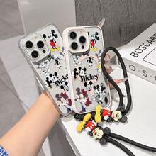 This Disney Mickey Mouse Lanyard Phone Case Is Fully Covered In TPU Material, Features Strong Magnetic Closure, Is Shockproof And Lightweight, And Is Compatible With IPhone17/16/11/13/15/15 Plus/15 Pro/15 Pro Max/12/14 Pro Max/11 Pro Max/12 Pro/12 Pro Max/13. This Phone Case Is A Popular Birthday Gift Or Business Gift Choice; It Is Durable, Stain- And Fingerprint Resistant, And Suitable For Both Men And Women. The Set Also Includes A Mickey Mouse Phone Case And A Mickey Mouse Plush Bracelet, Making It A Perfect Gift For Friends And Family. This Stylish Phone Case Is Fun, Lightweight, And Durable. IPhone17 Pro Max Phone Case, Minnie Mouse Phone Case. - màu đen - Xem 4