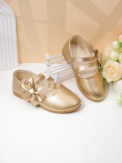 Giày búp bê Mary Jane màu trắng bóng có nơ cho bé gái, kiểu giày công chúa dự tiệc cho trẻ em.
