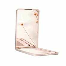 1 chiếc gương trang điểm nhỏ gọn cầm tay kèm lược, đồ dùng thiết yếu khi đi du lịch và dã ngoại. - Nhiều màu - Xem 3