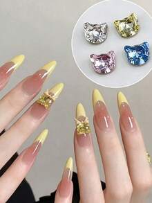 8 viên đá đính móng hình đầu mèo K9 chất lượng cao, bề mặt óng ánh tuyệt đẹp, hình dáng mèo KT tinh tế với điểm nhấn nơ, thiết kế đính đá lấp lánh. Nhiều màu sắc để lựa chọn, phù hợp với nhiều kiểu trang trí móng khác nhau, chắc chắn và dễ sử dụng, tạo nên vẻ ngoài sang trọng cho móng tay, phụ kiện trang trí móng DIY phổ biến. - Nhiều màu - Xem 1