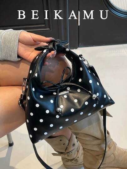 新款波点抽绳水桶包，蝴蝶结手提单肩包二合一，适合大学、通勤、购物、日常休闲使用