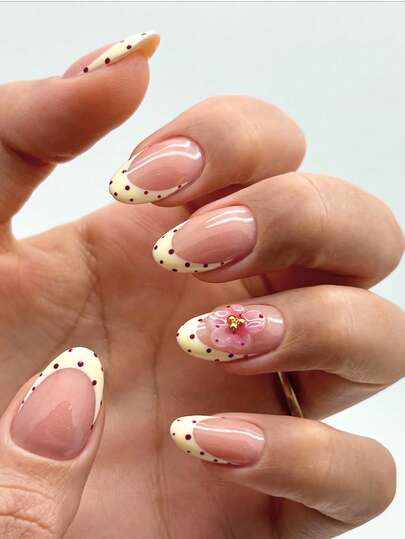 10pcs Handmade Nail Stickers, Short Fake Nails, Suitable For Summer Wear, Acrylic Nail Stickers, Summer Nails, Nail Sticker Set, Nail Art Supplies, Y2K Style, Nude Nails, Pink Nails, Red Nails, Yellow Nails, Nude Pink Base With Cream Yellow French Tips Decorated With Red Polka Dots, And 3D Pink Flower Decor With Golden Center On The Nails. Sweet And Cute Style, Suitable For Ladies And Girls To Wear For Outings, Dates And Casual Gatherings In Summer.