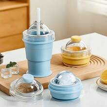 Bộ 1 cốc làm đá viên gấp gọn bằng silicon & khuôn đá viên tái sử dụng có nắp đậy kèm ống hút - Cốc du lịch tiện dụng cho cà phê, nước ép, sử dụng tại nhà, phòng tập thể dục và ngoài trời. Thiết kế chống rò rỉ, dễ dàng lấy đá ra. Được làm từ chất liệu silicon. - Nhiều màu - Xem 2