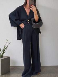 女士优雅两件套夏季套装，深V领长袖上衣搭配高腰带口袋长裤，不对称下摆设计 - 藏蓝色 - 查看 2