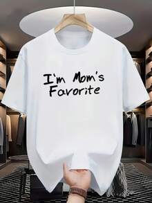 Tricou alb bărbătesc, 100% bumbac 180g, imprimeu distractiv "Sunt preferatul mamei" în negru intens, moale și respirabil, guler rotund, croială regulată, lavabil la mașină, ideal pentru sală, casual și cadou de Ziua Mamei - alb - Vizualizare 1