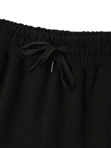Pantalones cortos negros con cordón y cintura elástica para hombres, pantalones cortos deportivos casuales y sueltos, transpirables, versátiles para uso diario, correr, fitness, estilo callejero - Negro - Ver 6