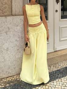 Conjunto de 2 piezas de estilo francés casual para mujer, apropiado para vacaciones y uso diario, compuesto por top corto sin mangas en color amarillo claro y falda larga acampanada de cintura alta - Amarillo - Ver 11